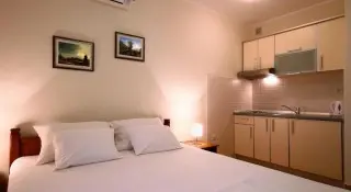 Apartmani Holiday