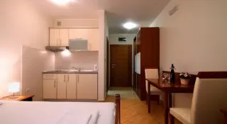 Apartmani Holiday