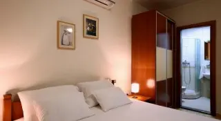 Apartmani Holiday