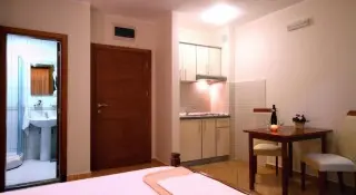 Apartmani Holiday