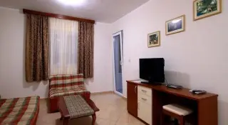 Apartmani Holiday