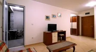 Apartmani Holiday