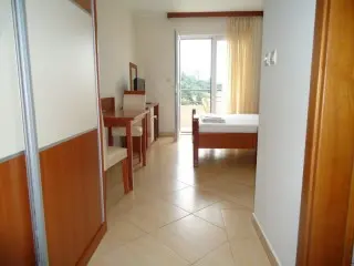Apartmani Holiday